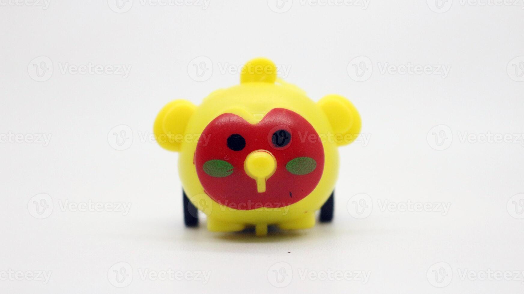 Cute yellow toy car isolated photo