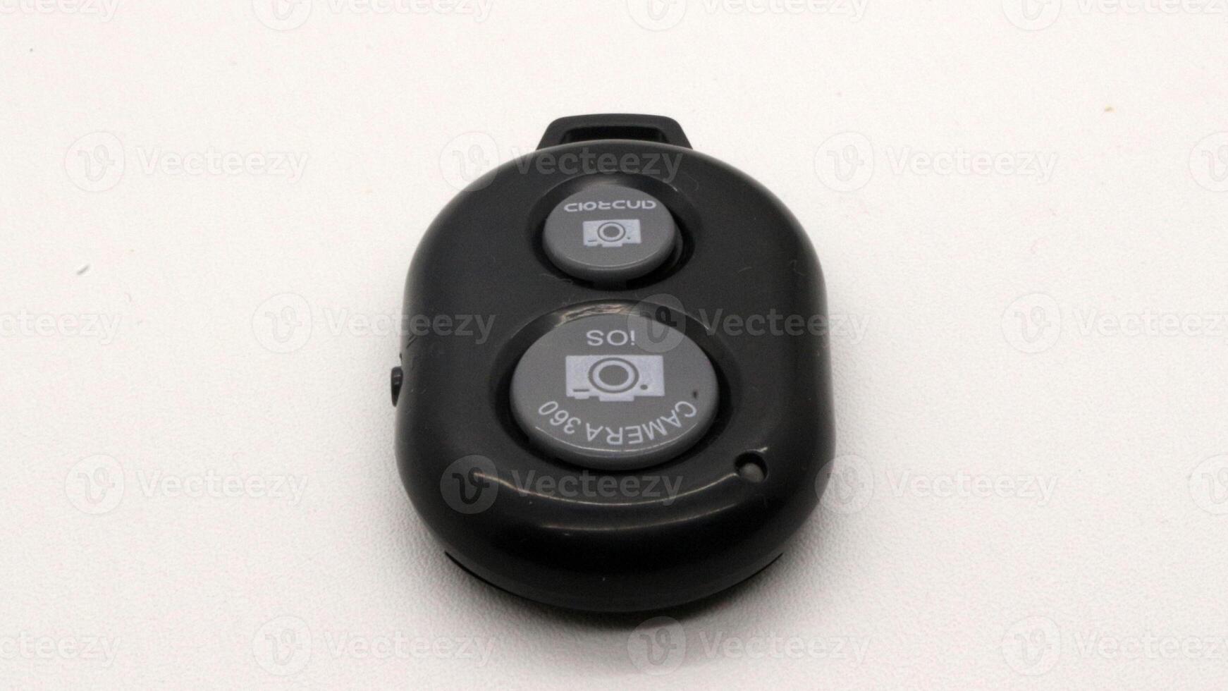 Bluetooth shutter remote for camera isolated photo