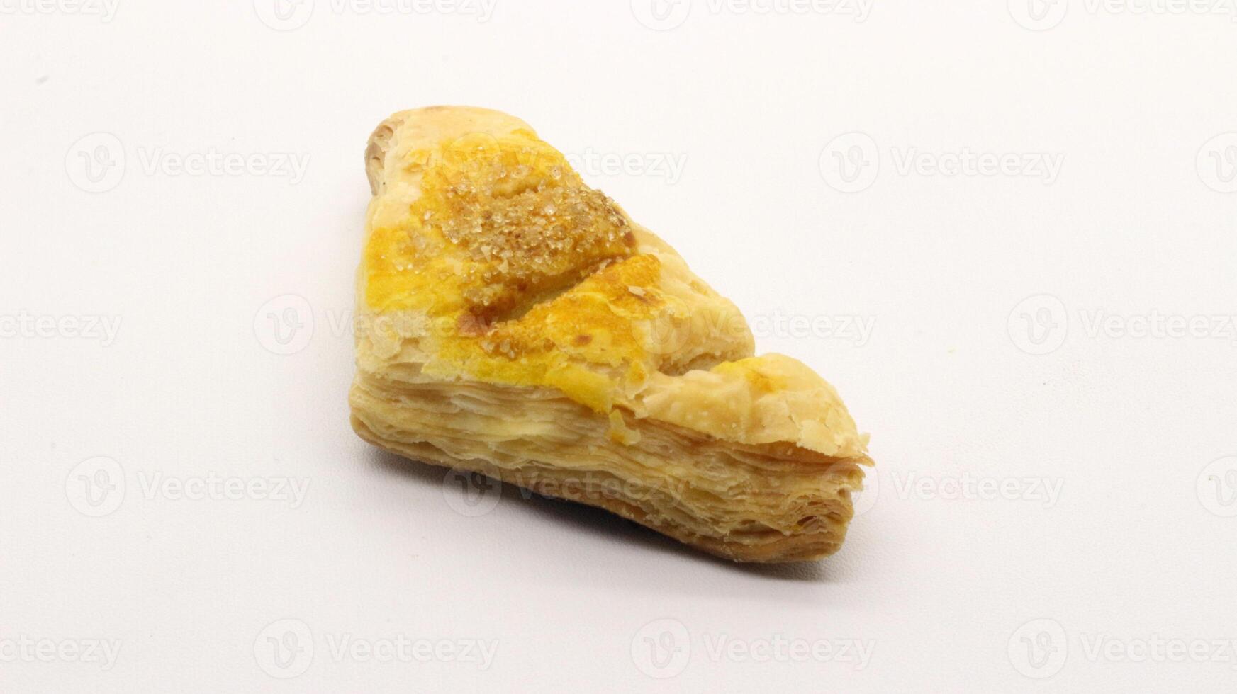 Chocolate pastry cake with a triangular shape photo