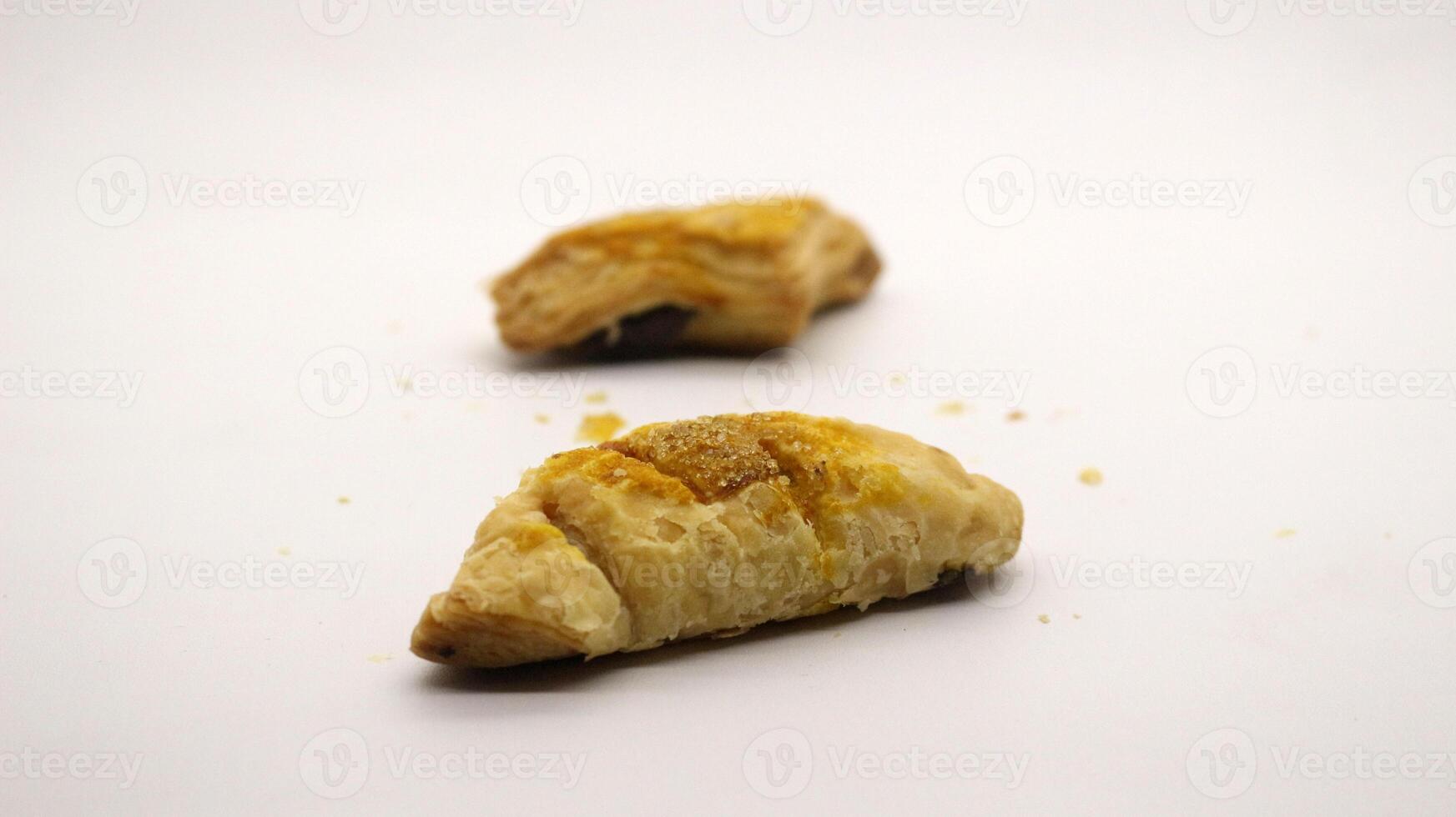 Chocolate pastry cake with a triangular shape photo