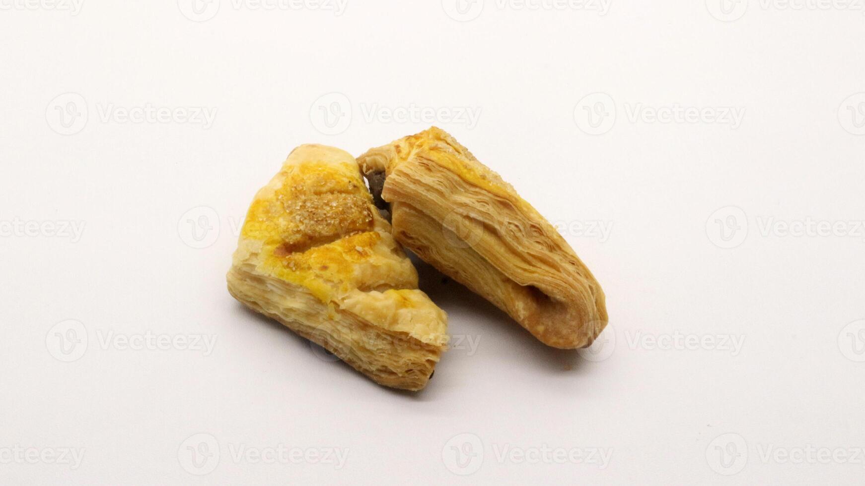 Chocolate pastry cake with a triangular shape photo