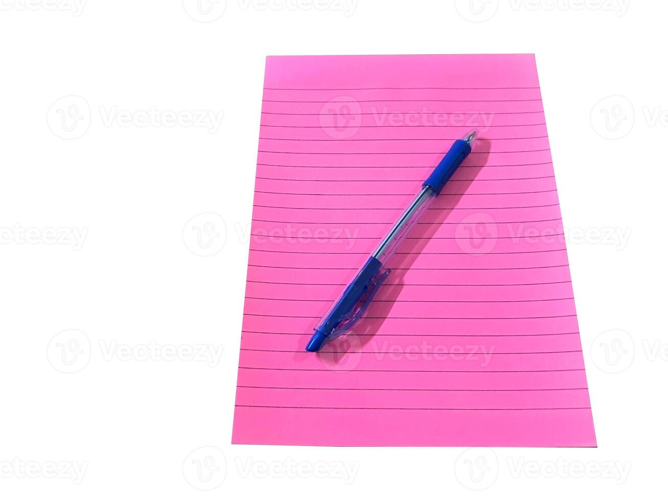 Top view of Pink notebook with pencil placing over it isolated on white background photo