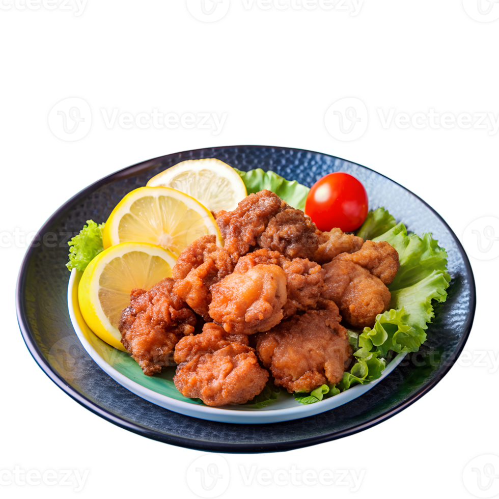 A delicious plate of crispy fried chicken served with fresh lemon slices and a cherry tomato on a bed of lettuce. png