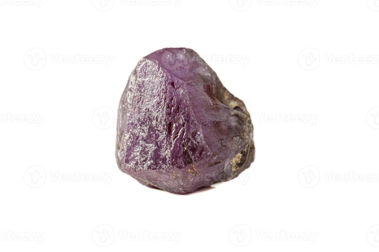 macro mineral stone alexandrite red - violet in daylight on a white photo
