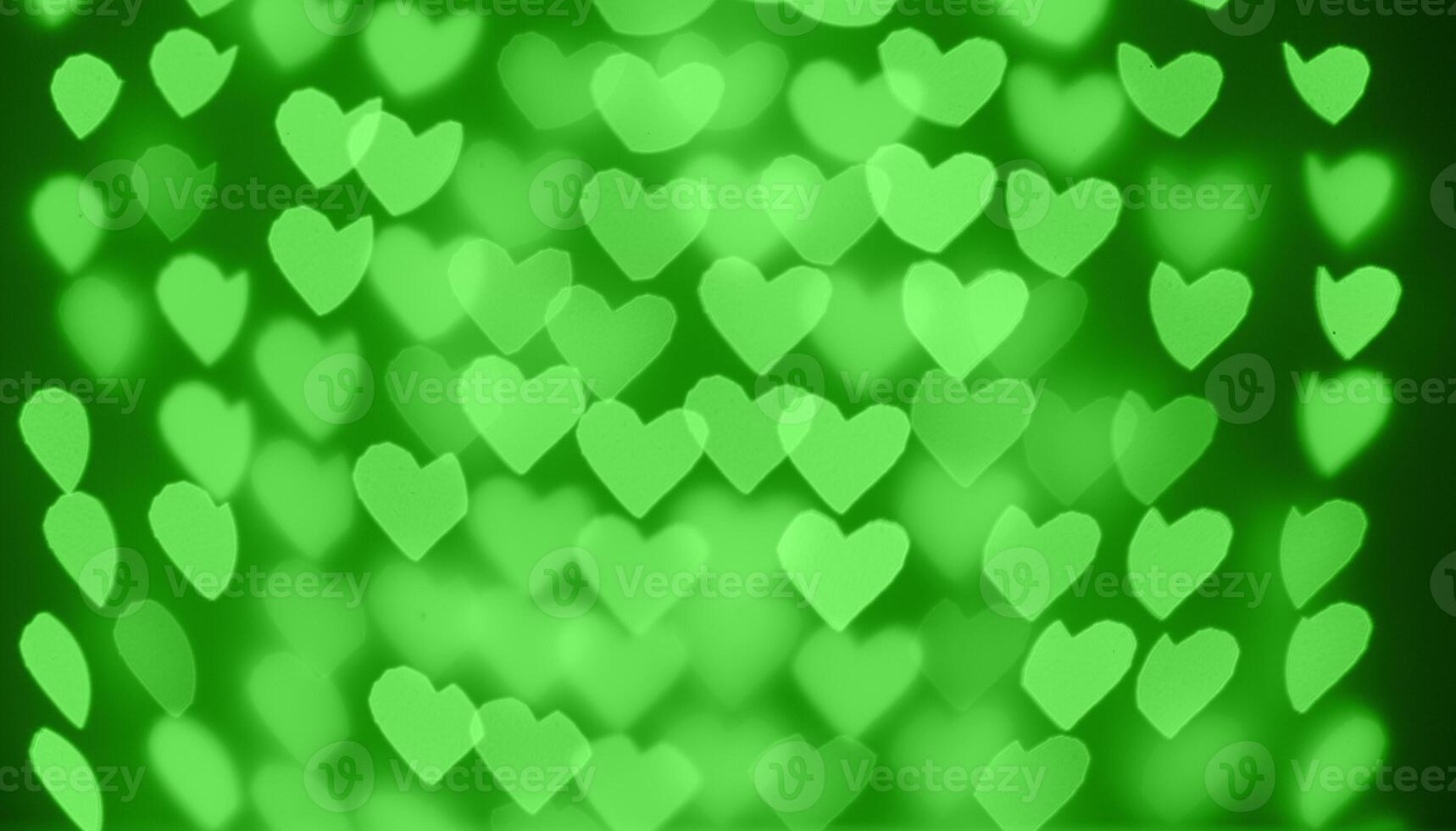 beautiful hearts made of lights on a blurred background photo