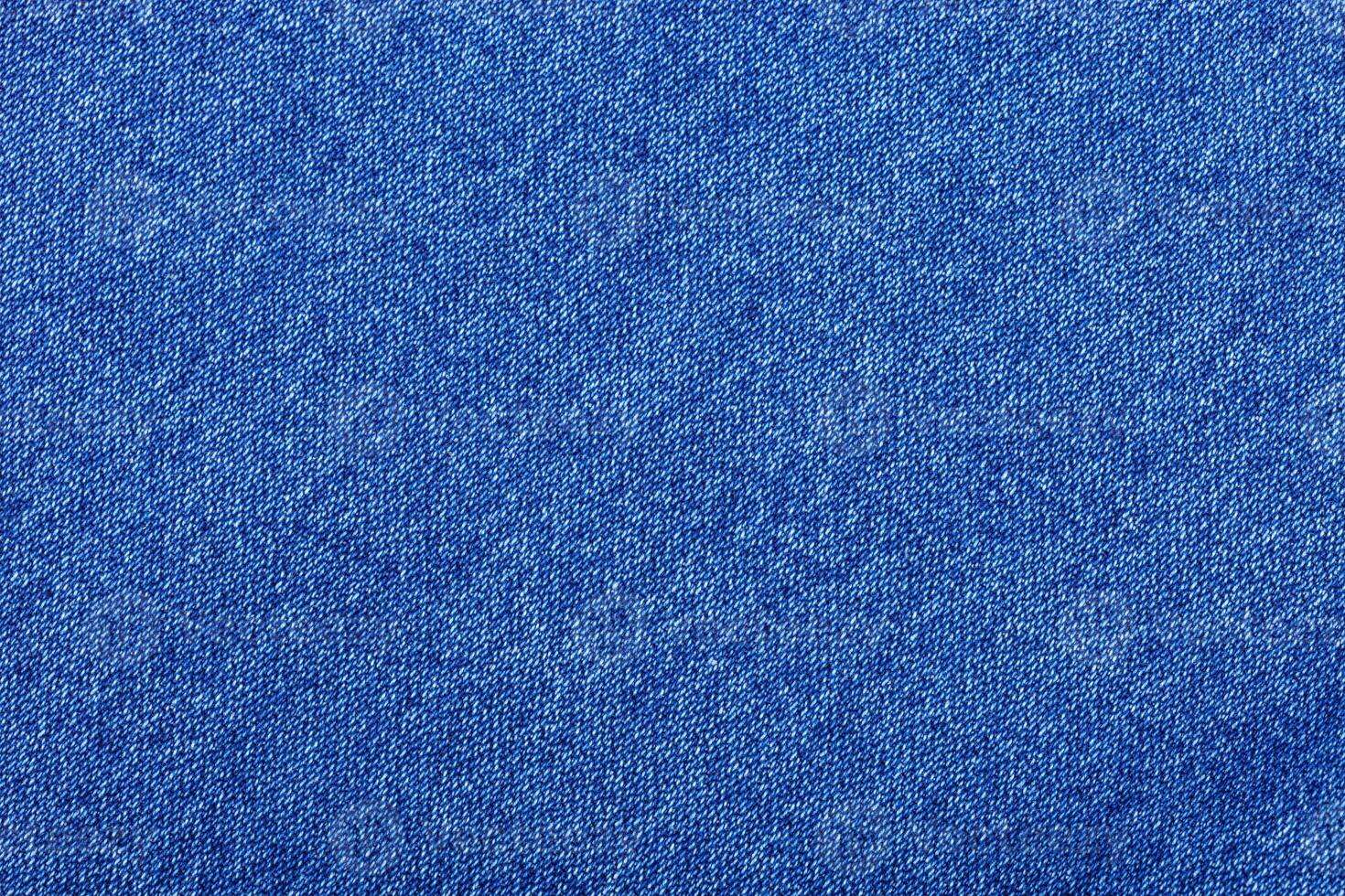 blue color jeans texture, factory fabric on white background photo