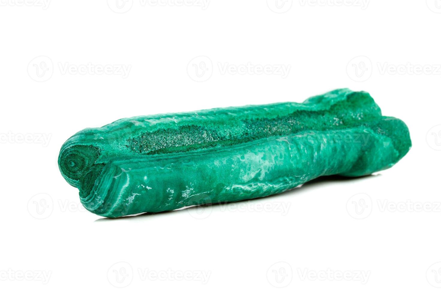 Macro mineral stone malachite stalactite on white background photo