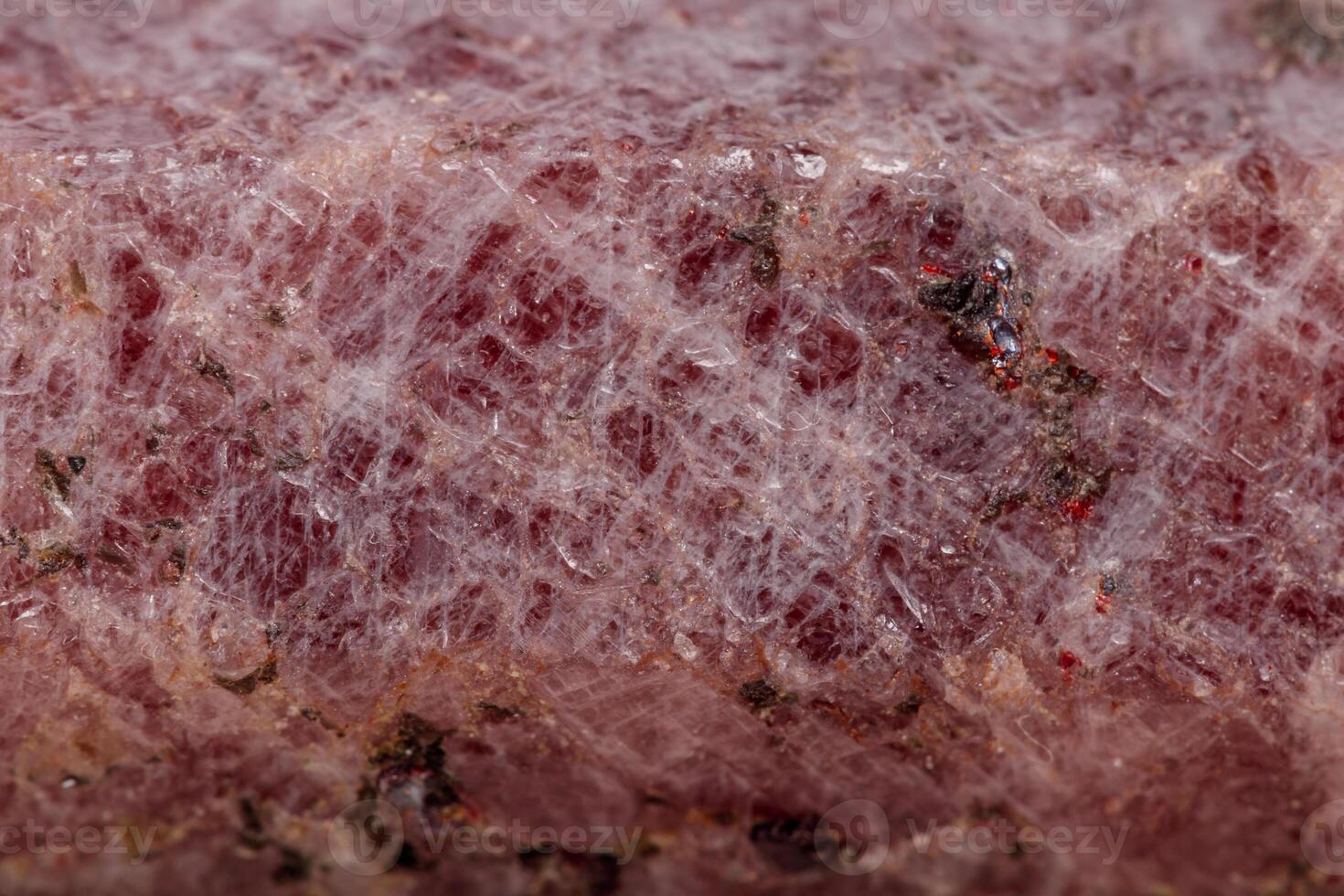 Macro mineral stone Ruby in the breed a white background photo