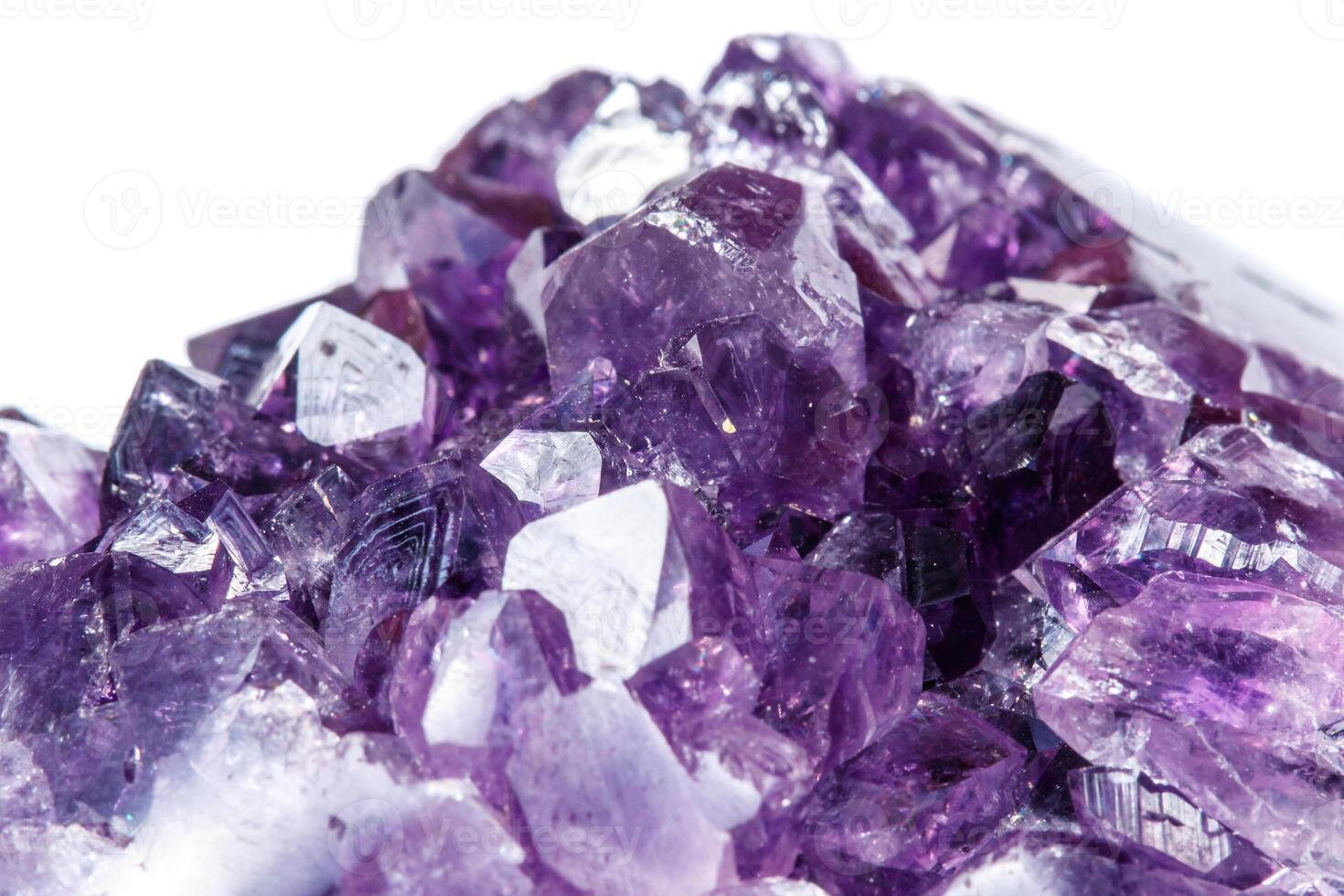 Amethyst Crystal Druse macro mineral on white background photo