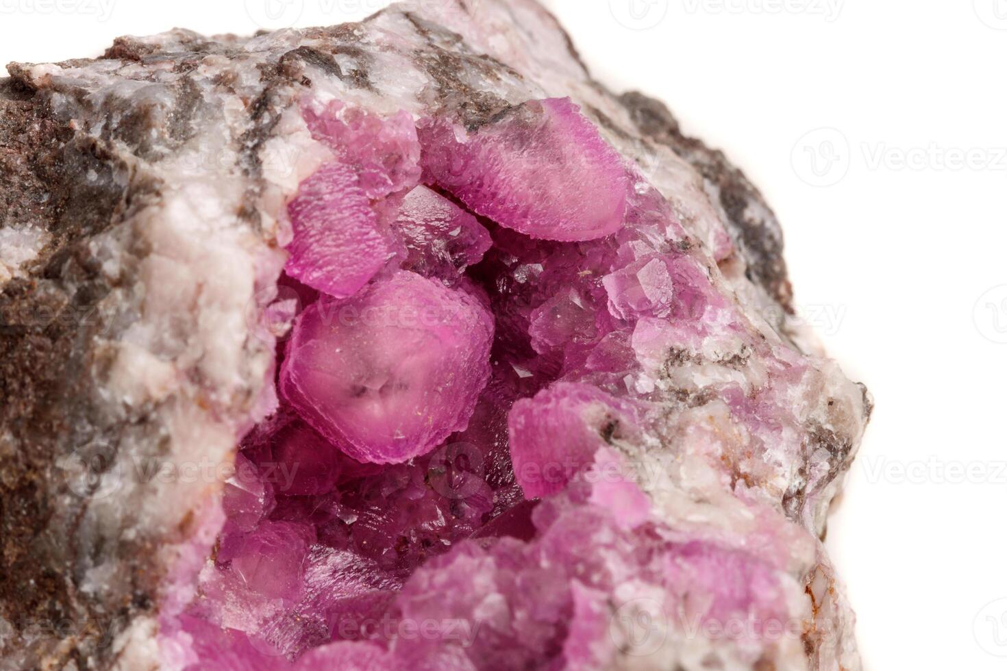 Macro mineral stone Cobalt Calcite rock on white background photo