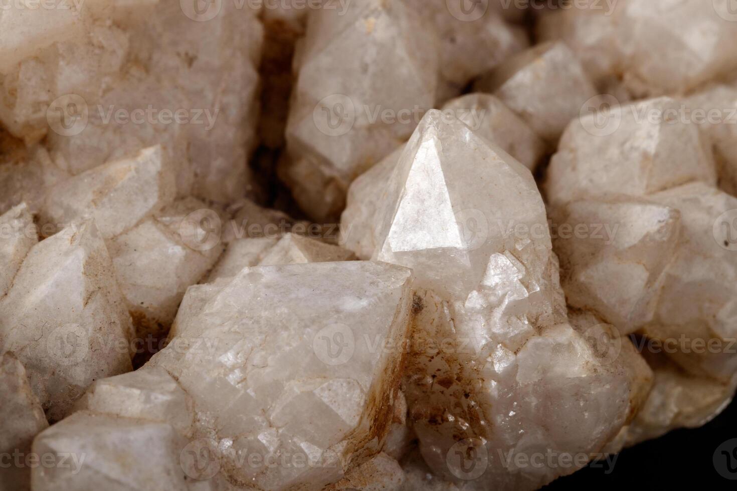 Macro Mineral Snow quartz Crystals on Black Background photo