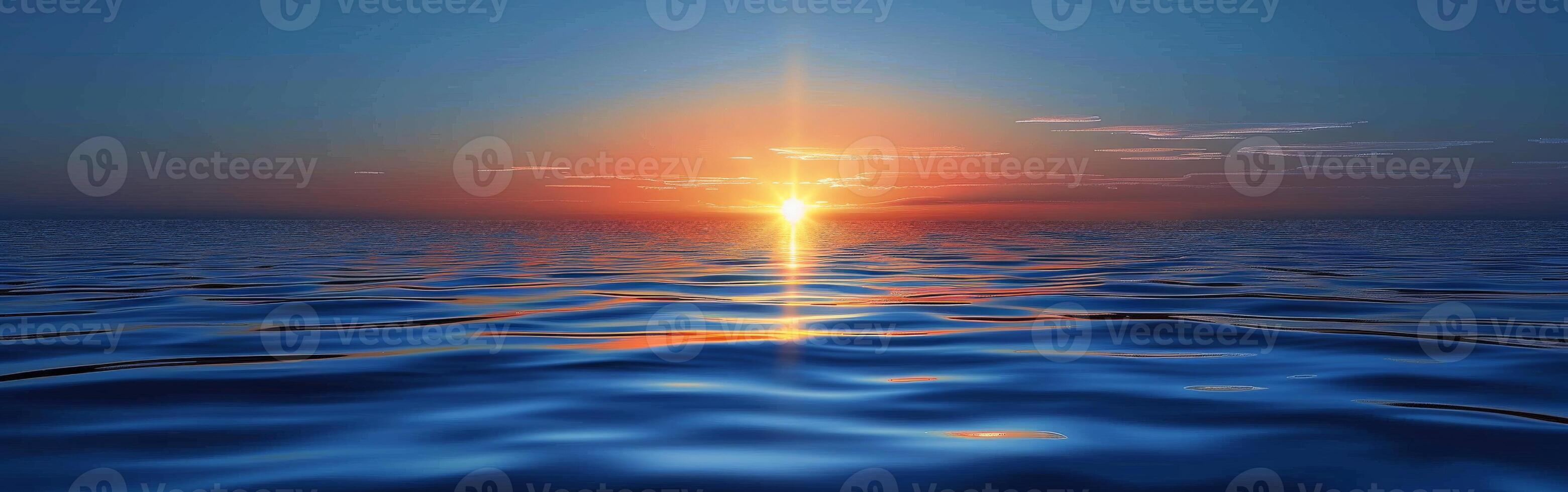 Tranquil Sunset Reflections on Calm Ocean Waters photo