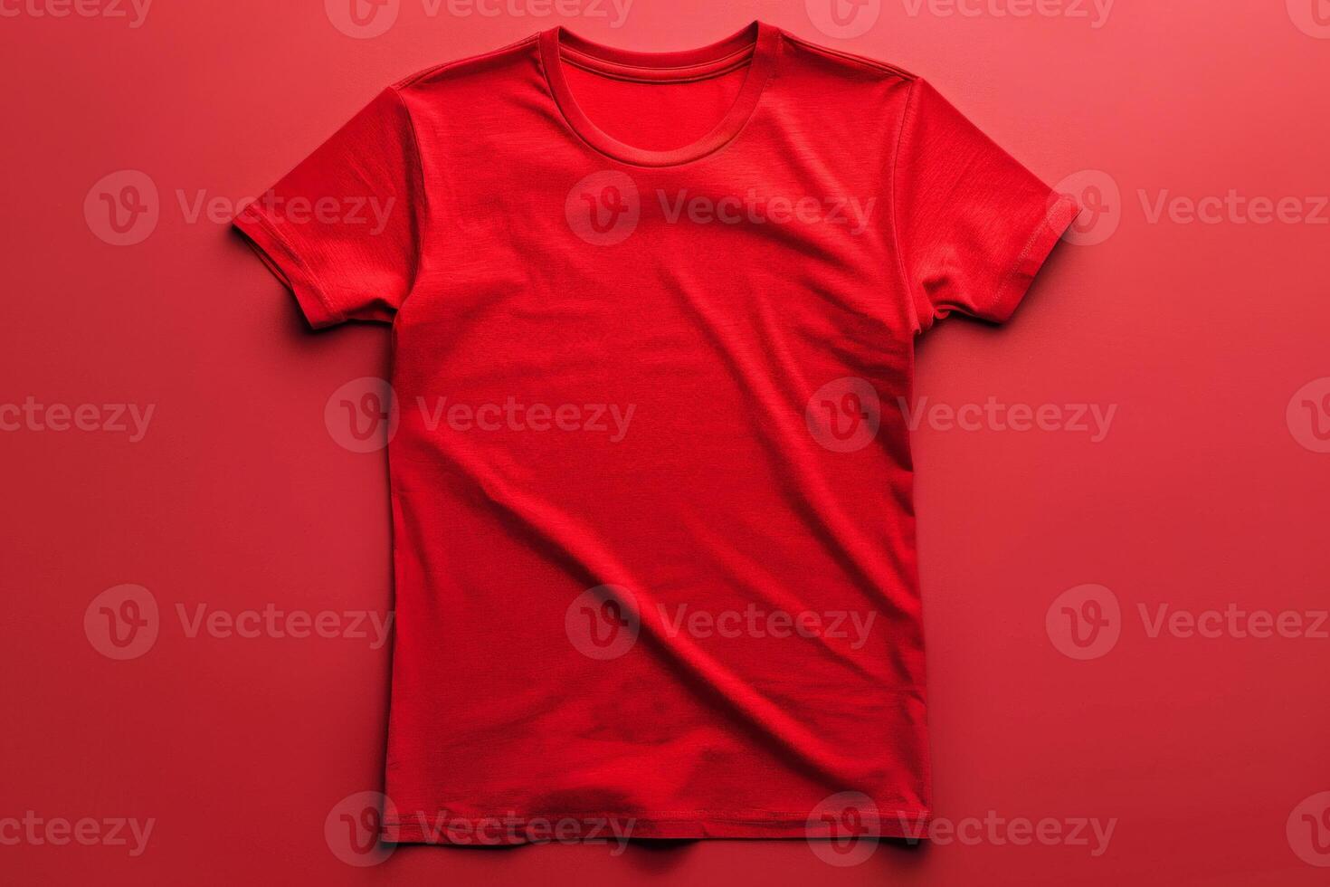 Red T-Shirt Laid Flat on Red Background photo
