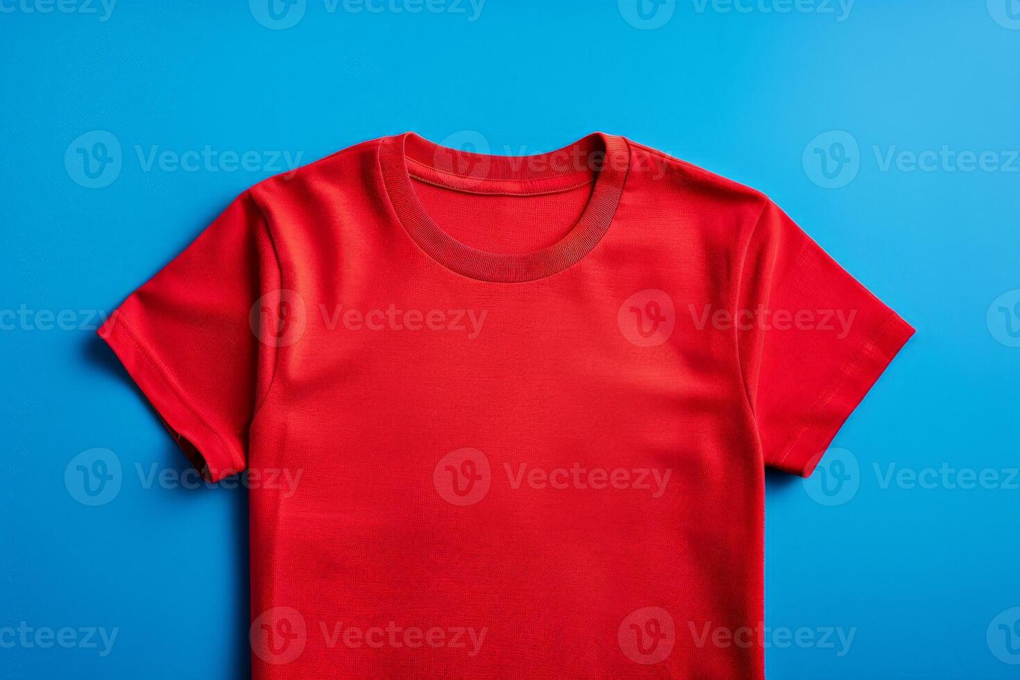 Red Short Sleeve T-Shirt Flat Lay on Blue Background photo