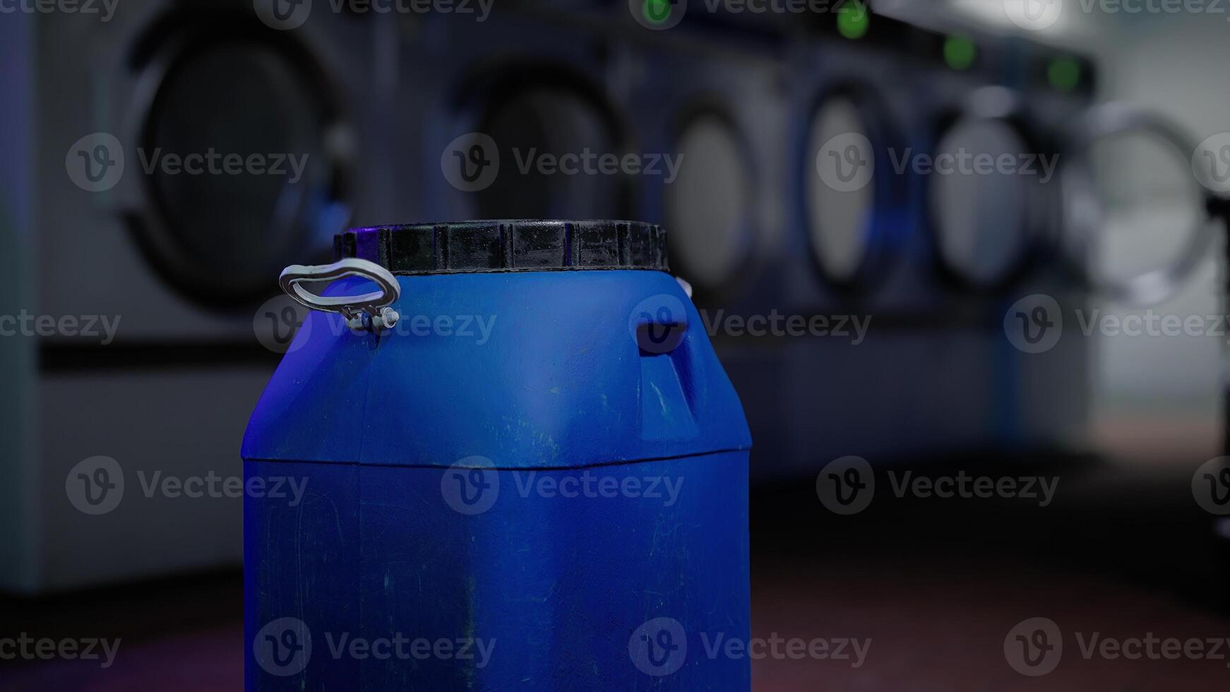 A blue barrel with a handle photo