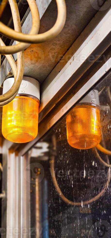 Emergency siren, Flashing light, Warning light, Emergency light. The amber flasher rotates rapidly. Slow motion. Light photo