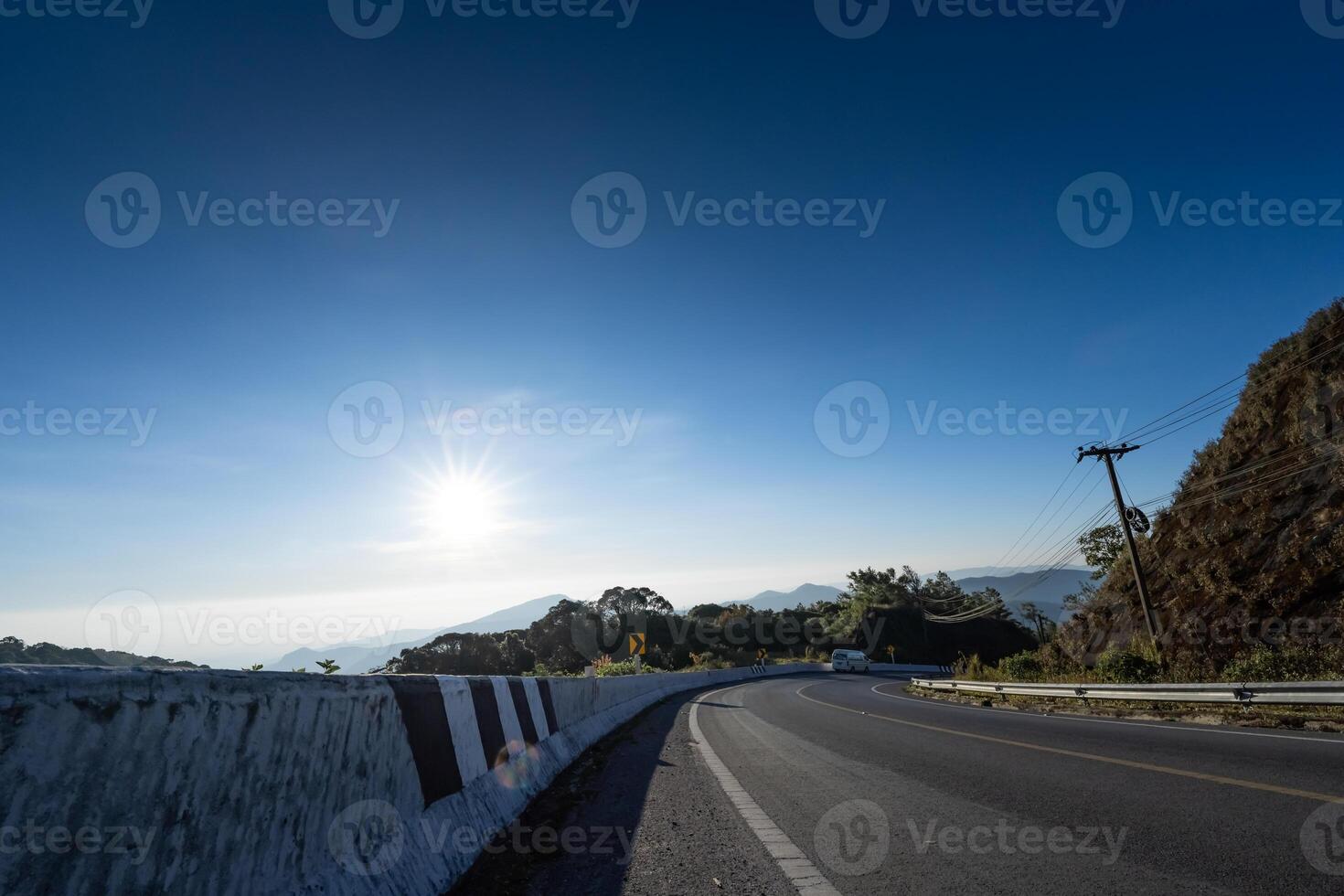 Winding road in the midst of mountain nature on the way to Doi Inthanon. Chiang Mai Province. photo