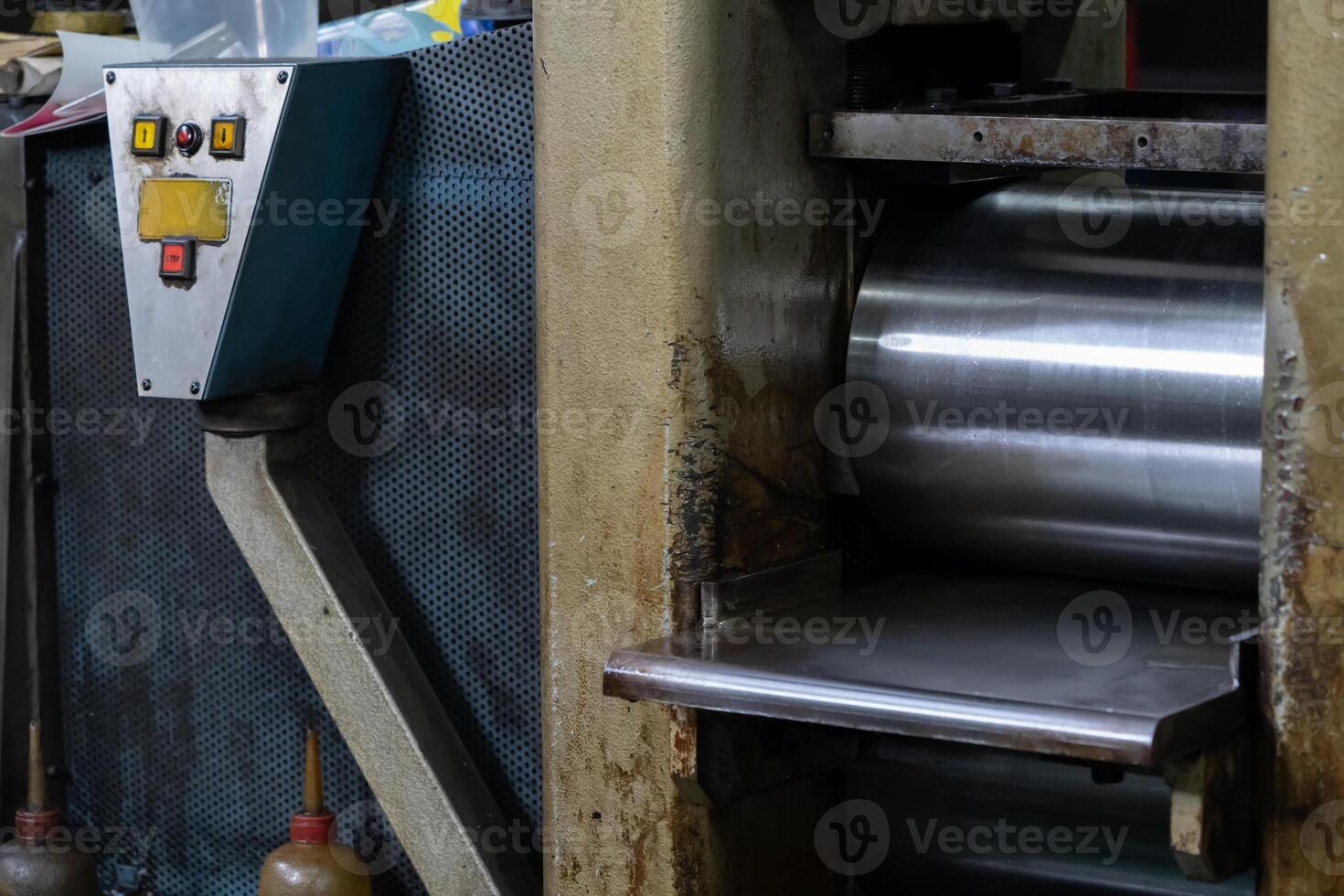 Machine and tool of Computer numerical control CNC, factory creates metal religion art such as Gold rolling machine and little jewelry in religious ceremony. photo