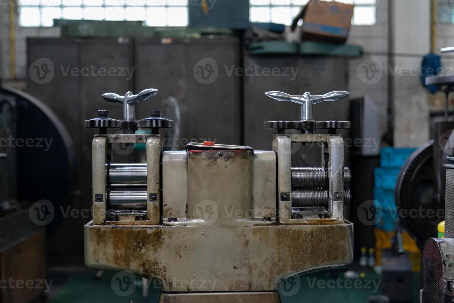 Machine and tool of Computer numerical control CNC, factory creates metal religion art such as Gold rolling machine and little jewelry in religious ceremony. photo