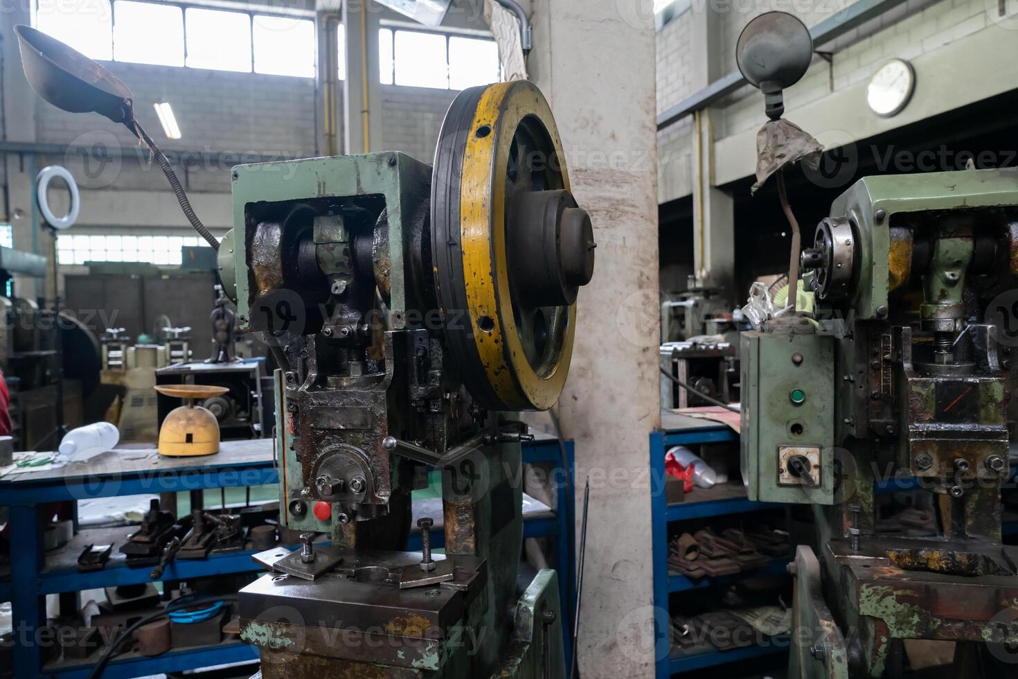 Machine and tool of Computer numerical control CNC, factory creates metal religion art such as Gold rolling machine and little jewelry in religious ceremony. photo