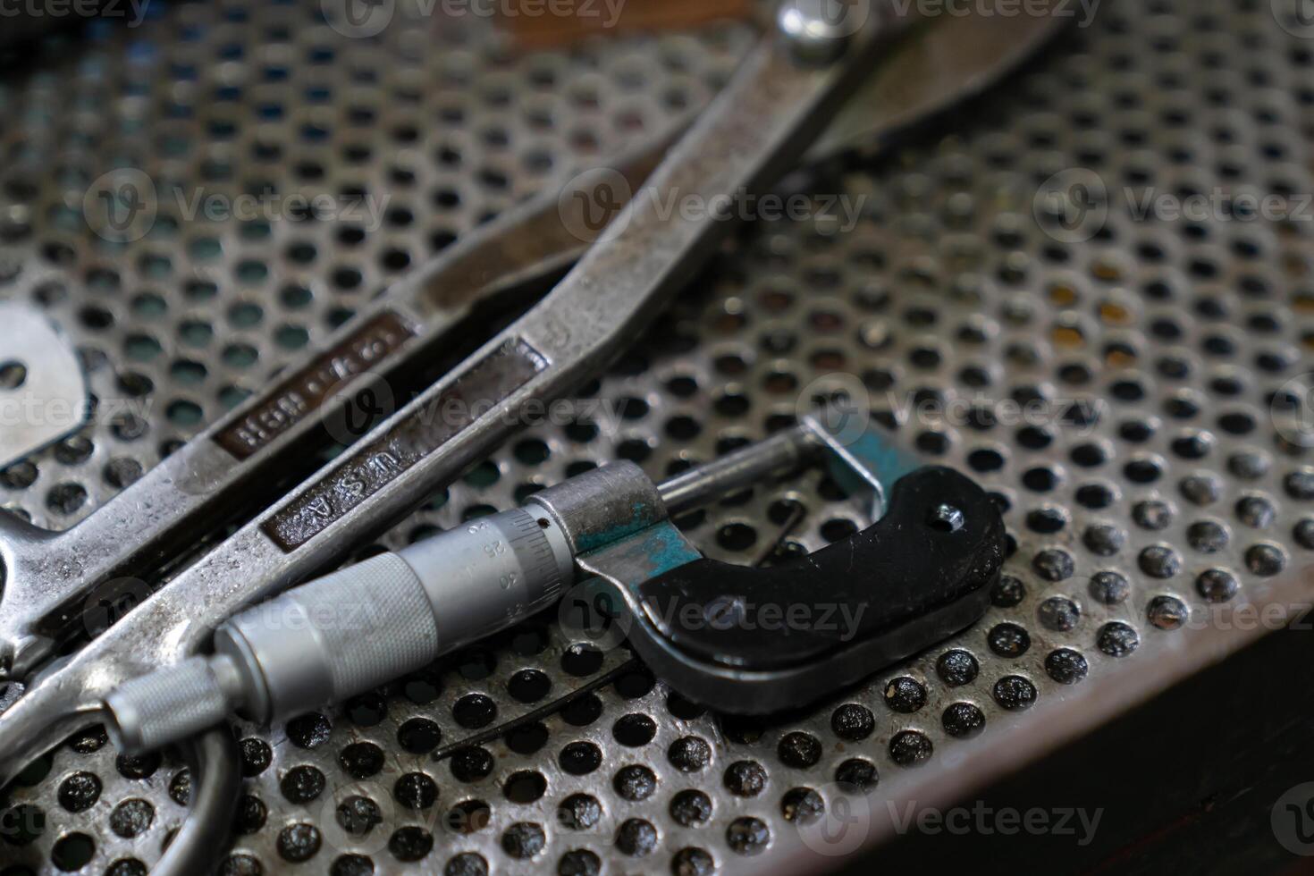 Machine and tool of Computer numerical control CNC, factory creates metal religion art such as Gold rolling machine and little jewelry in religious ceremony. photo
