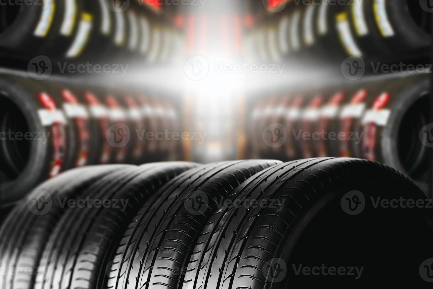 Car tire shop concept , New car tire and tire stacked on sideways background with copy space for text photo