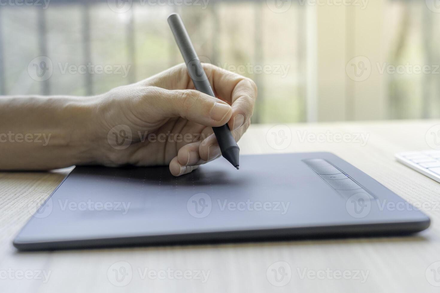 artist using graphics tablet. photo
