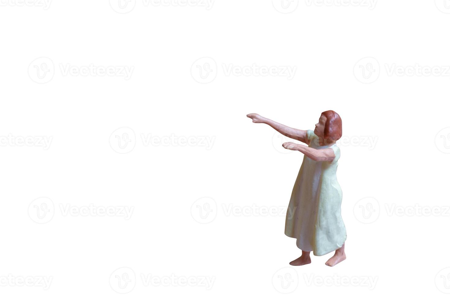 A woman sleepwalking in pajamas isolated on a white background with clipping path photo