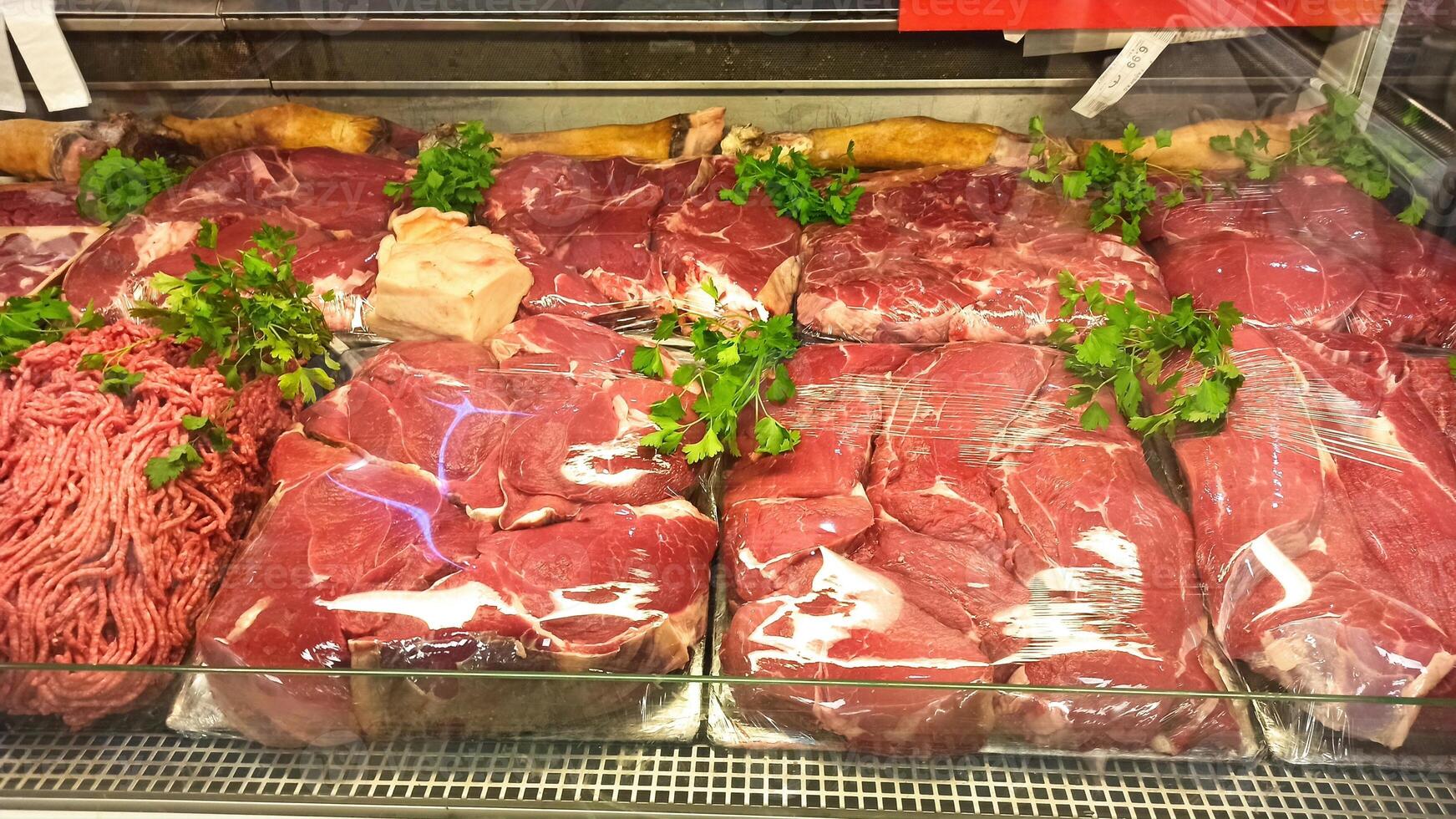 Fresh Meat Display In A Supermarket photo