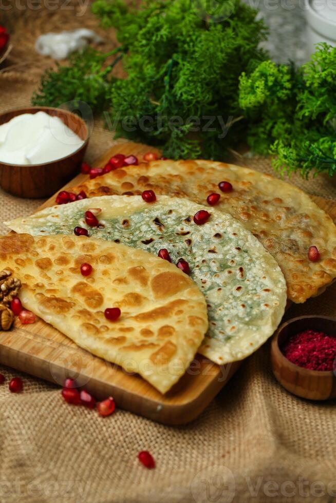 Chebureki With Pomegranate and Parsley photo