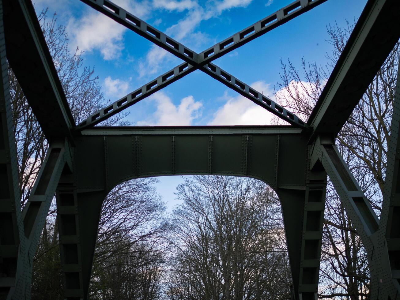 a bridge with a sky background photo
