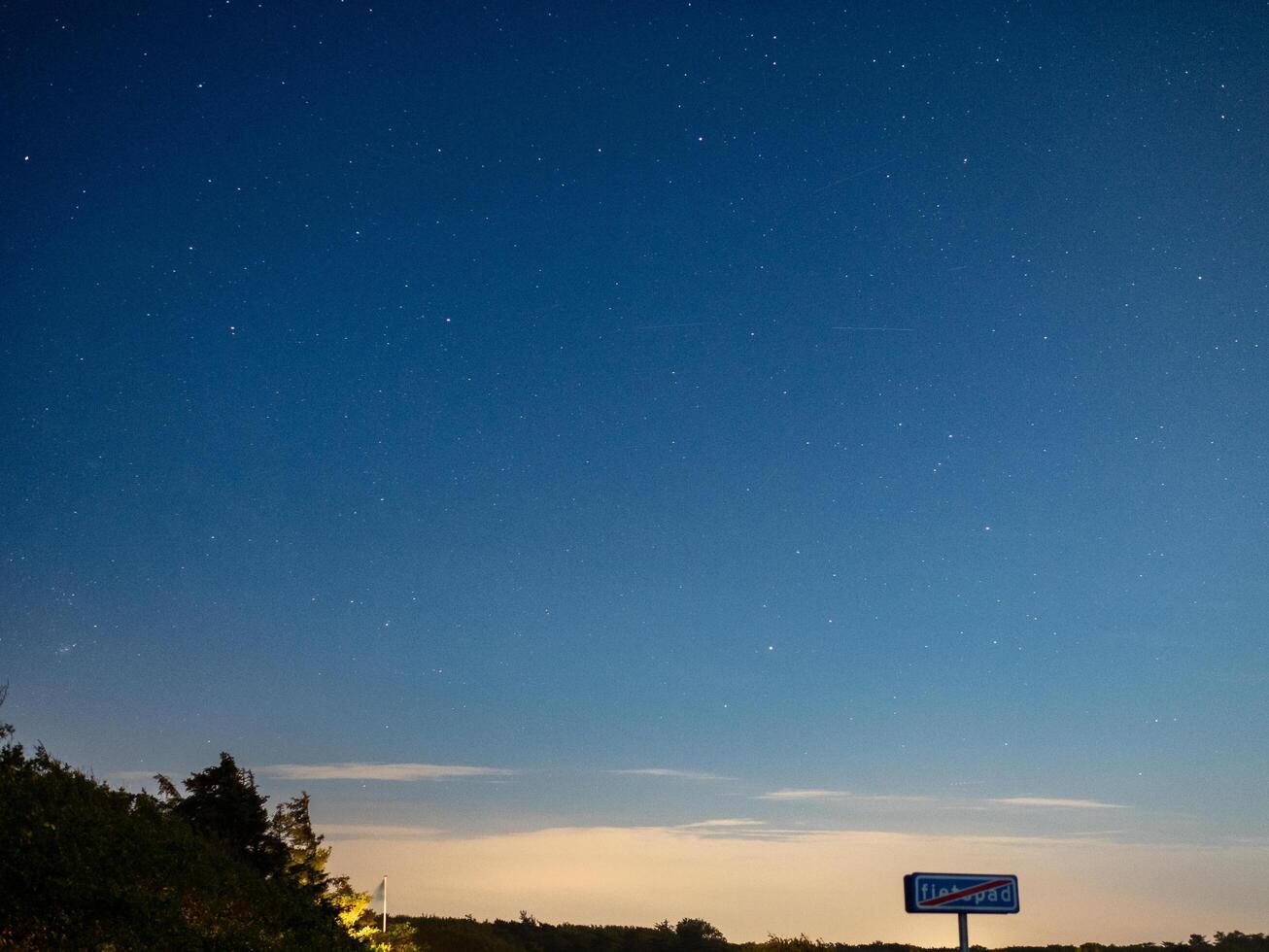 Stars above Dutch bikelane sign photo