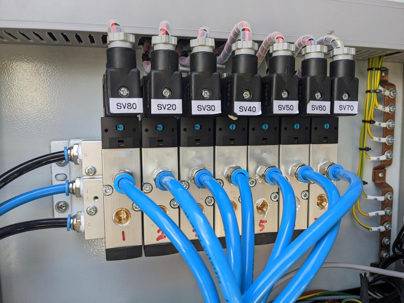 Pneumatic Control Panel with Valves and Tubing photo