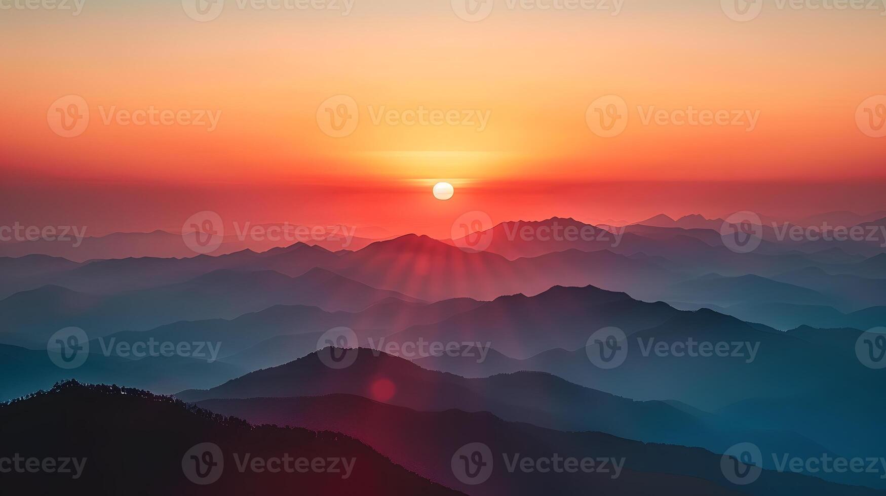 Sunset over a mountain range, vibrant gradient sky photo