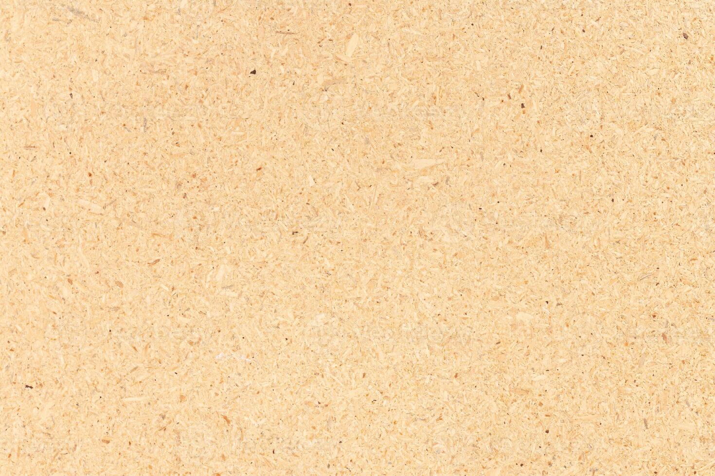Natural recycled chipboard background texture. Full frame photo