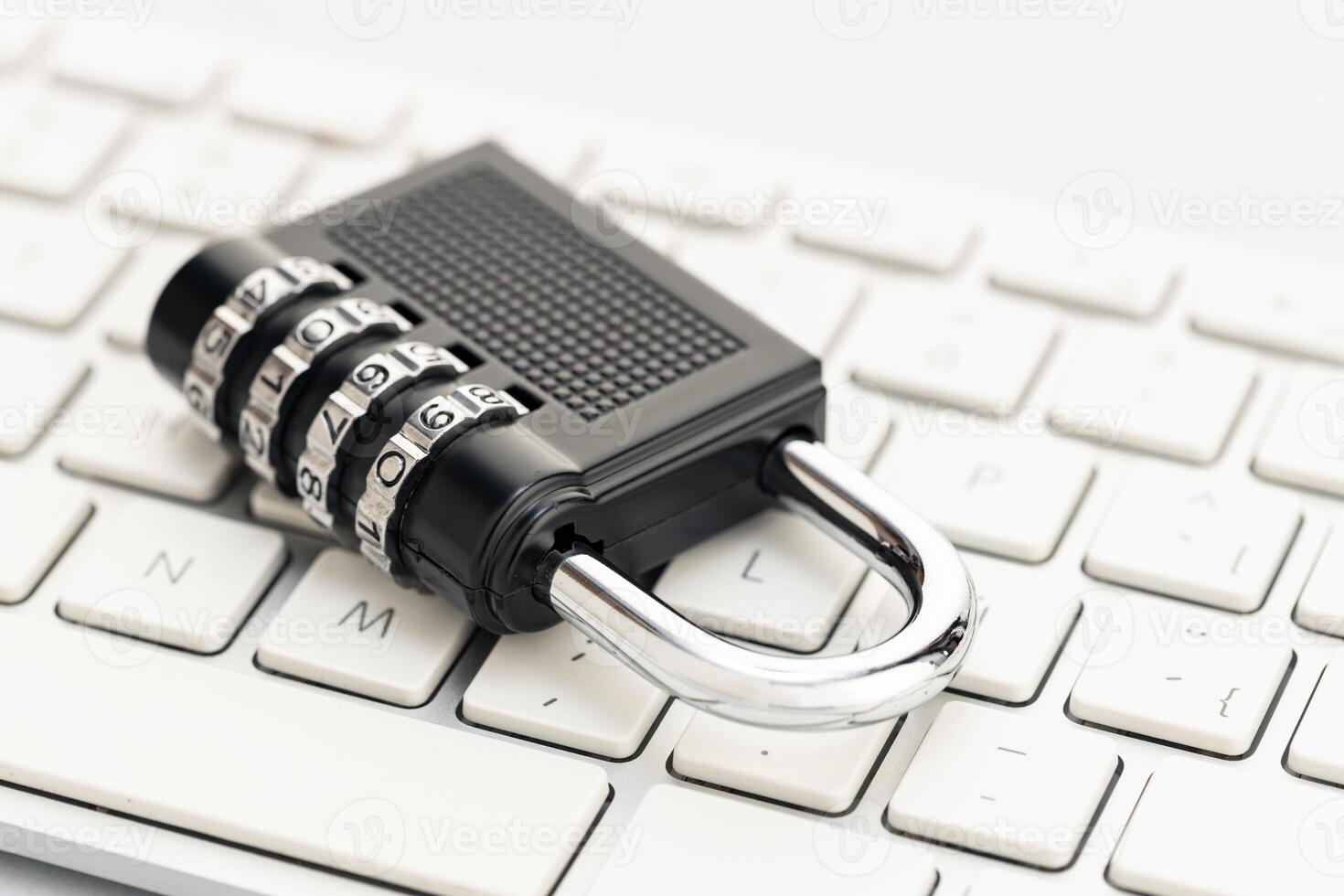 Closed padlock on computer keyboard. Cyber security concept photo