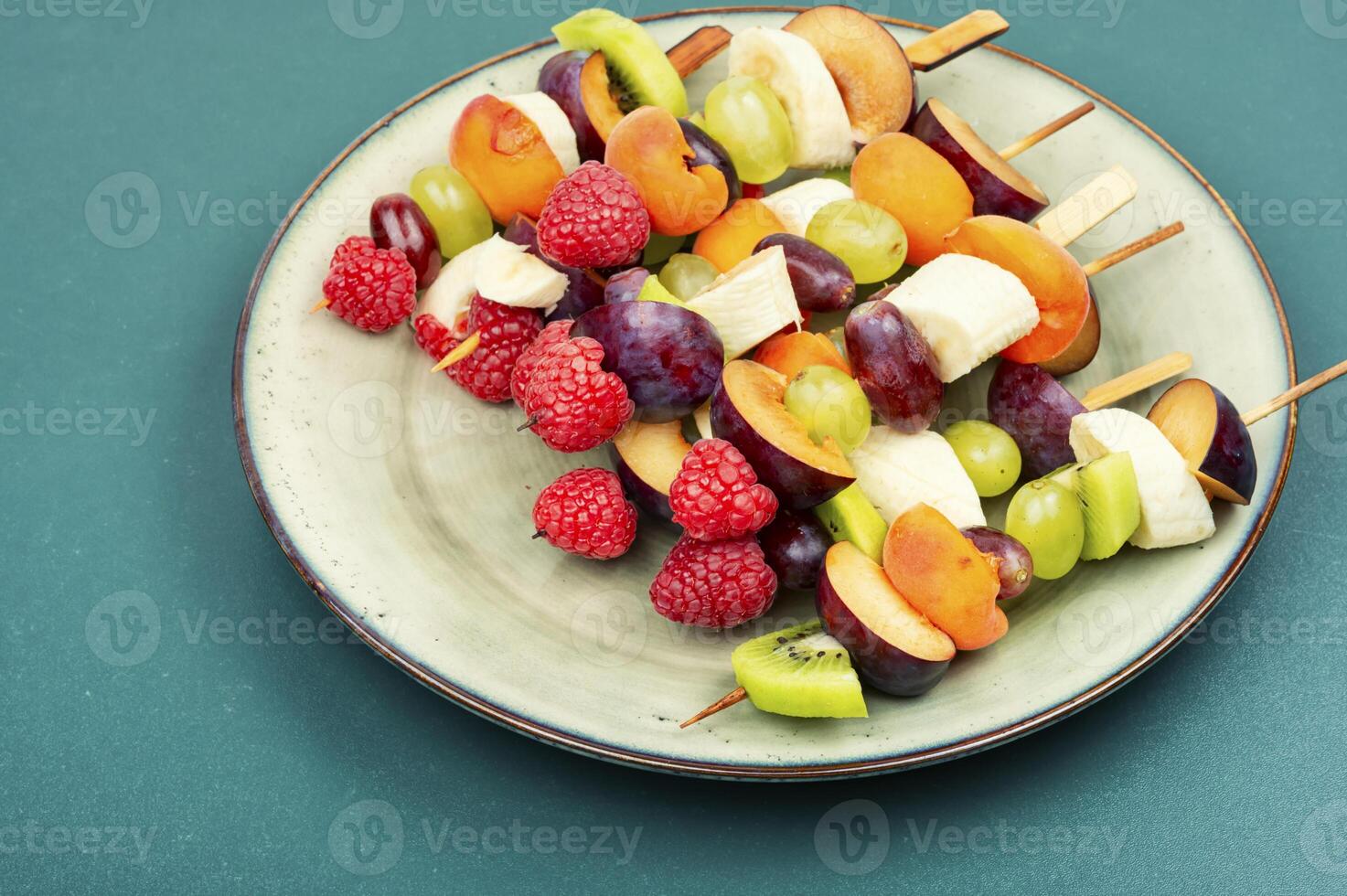 Fruit sweet kebabs. photo