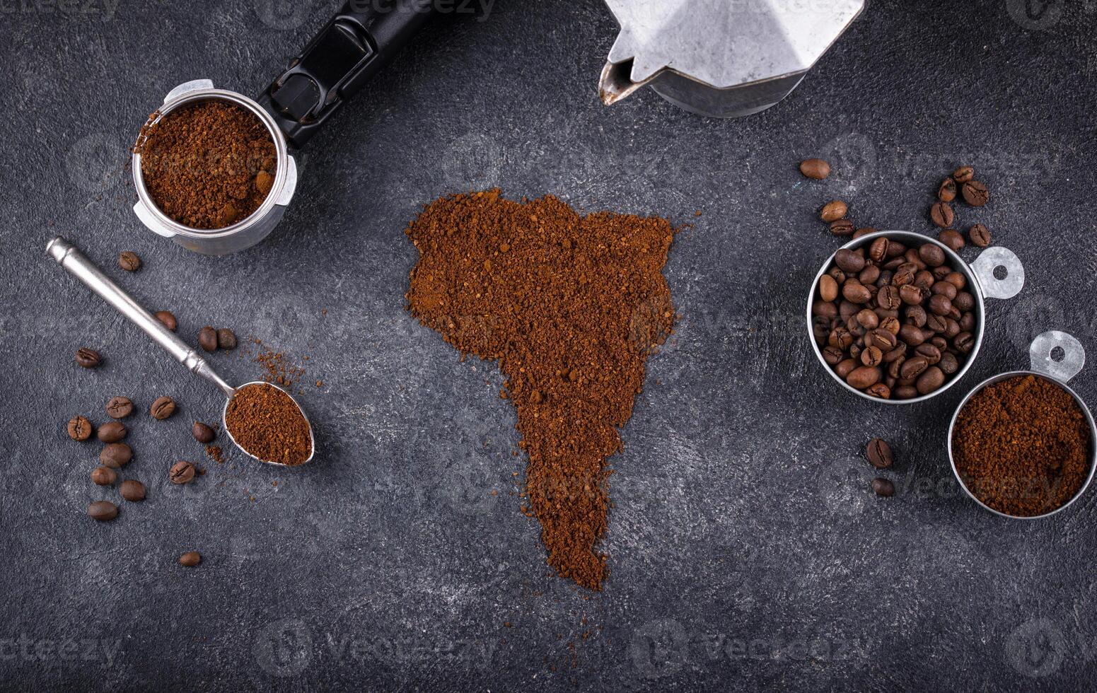 Grounded coffee and beans from South America photo