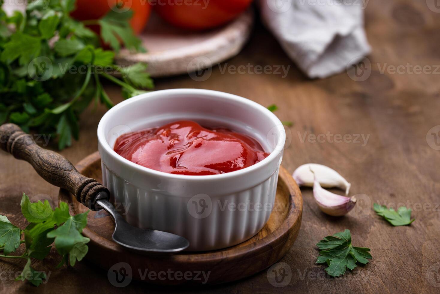 Fresh homemade tomato sauce with garlic photo