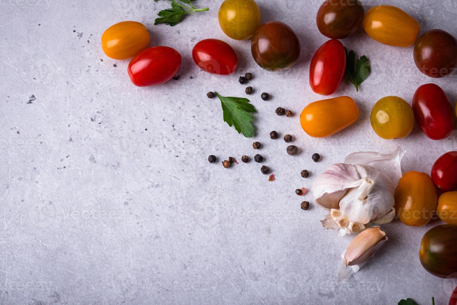 Assortment of different cherry tomatoes photo
