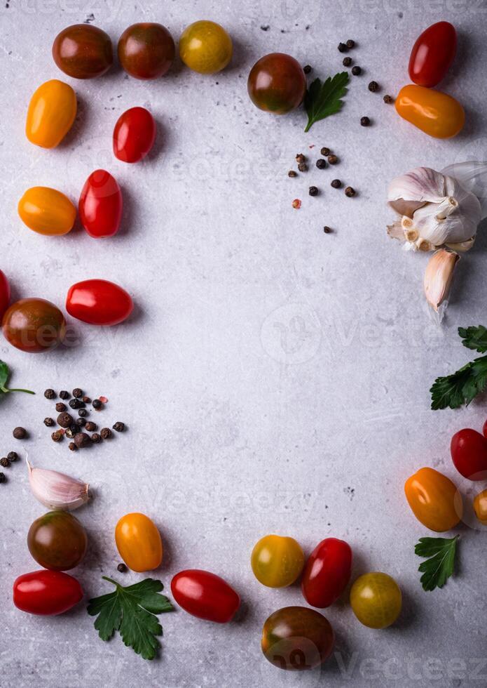 Assortment of different cherry tomatoes photo