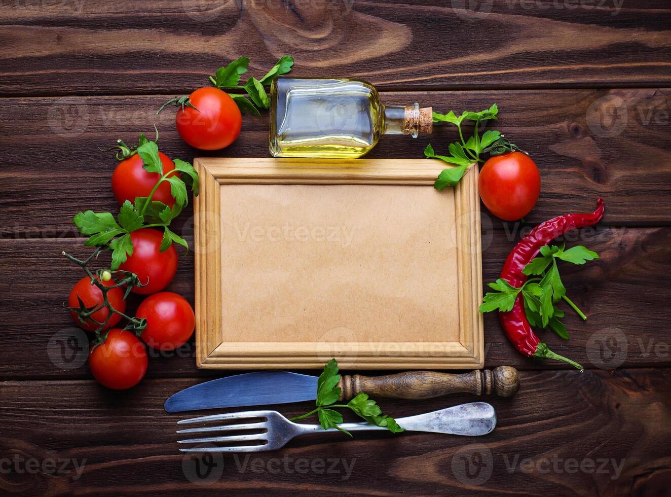 Fresh cherry tomato, parsley and frame for text photo