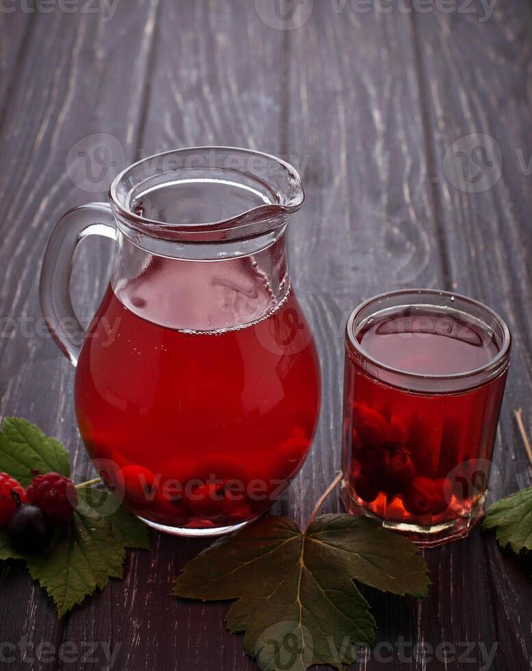 Fresh berry drink with black currant and raspberries photo