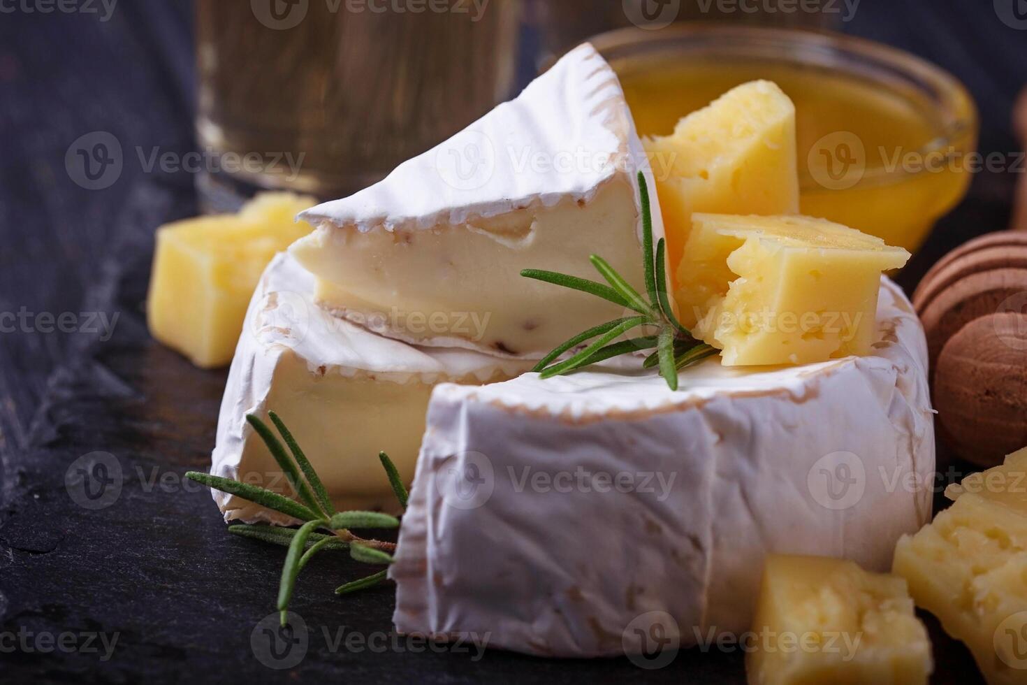 Camembert cheese with honey and wine photo