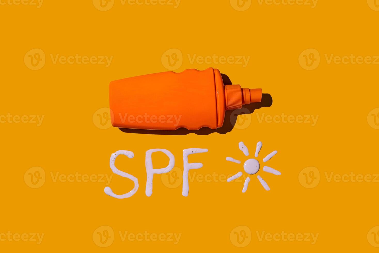 Sunscreen SPF cream on yellow background photo