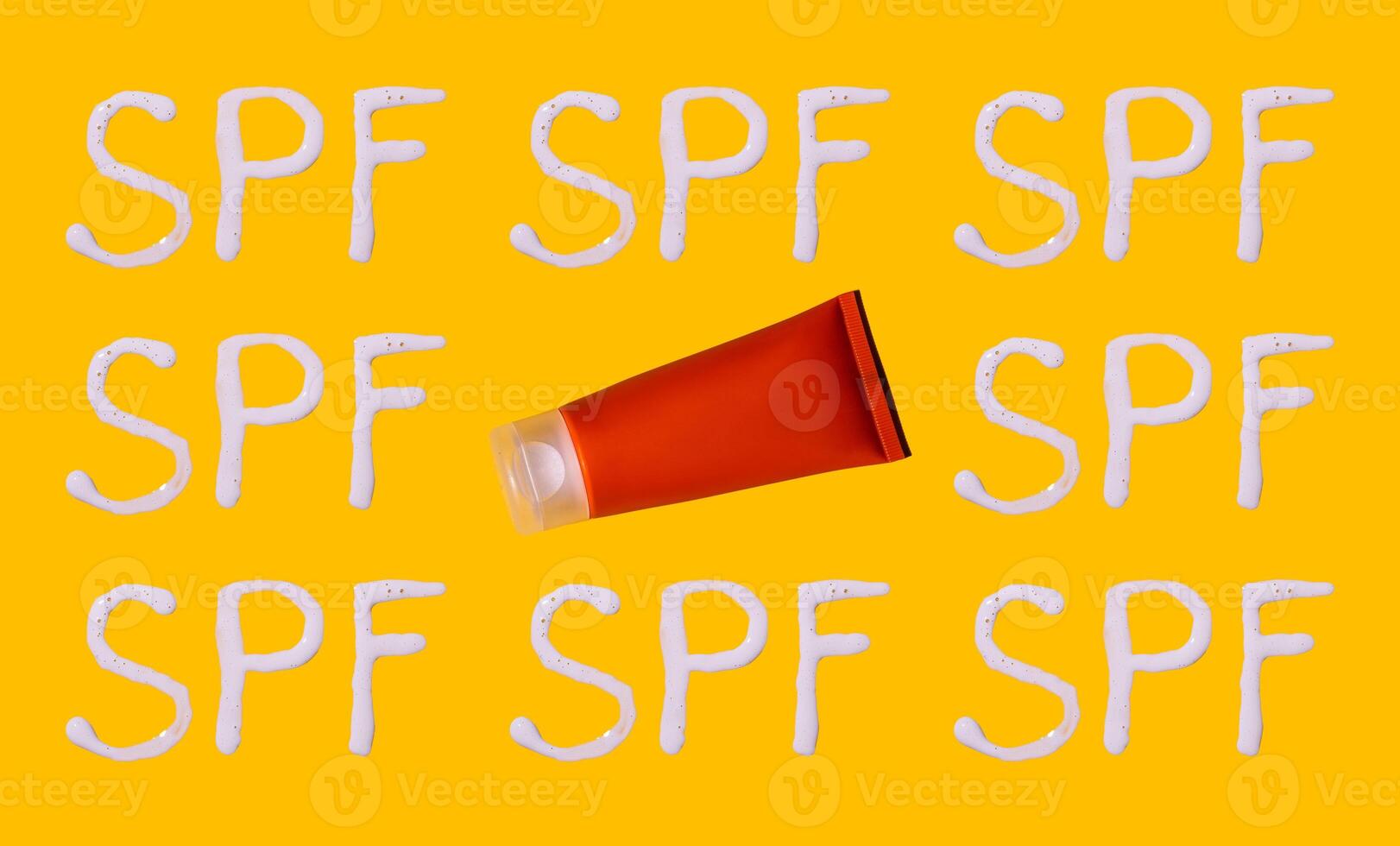 Sunscreen SPF sunblock cream on yellow background photo
