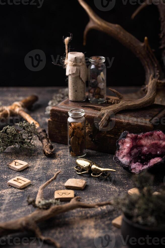 Esoteric magical background with runes. photo