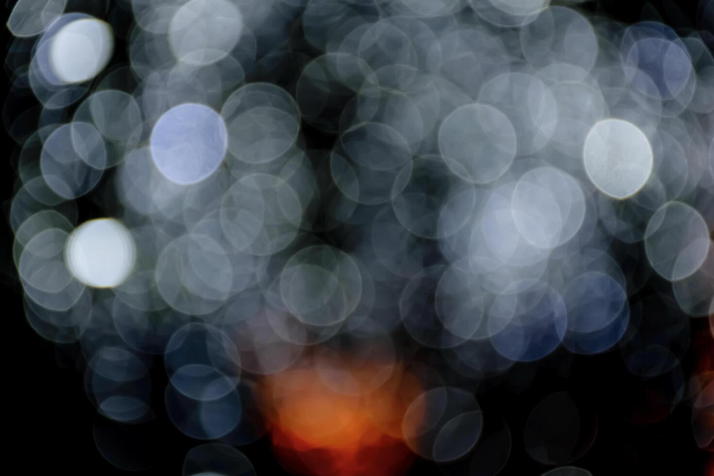 Abstract dark background with glowing turquoise particles with depth of field effect, easy to put over any photo. photo