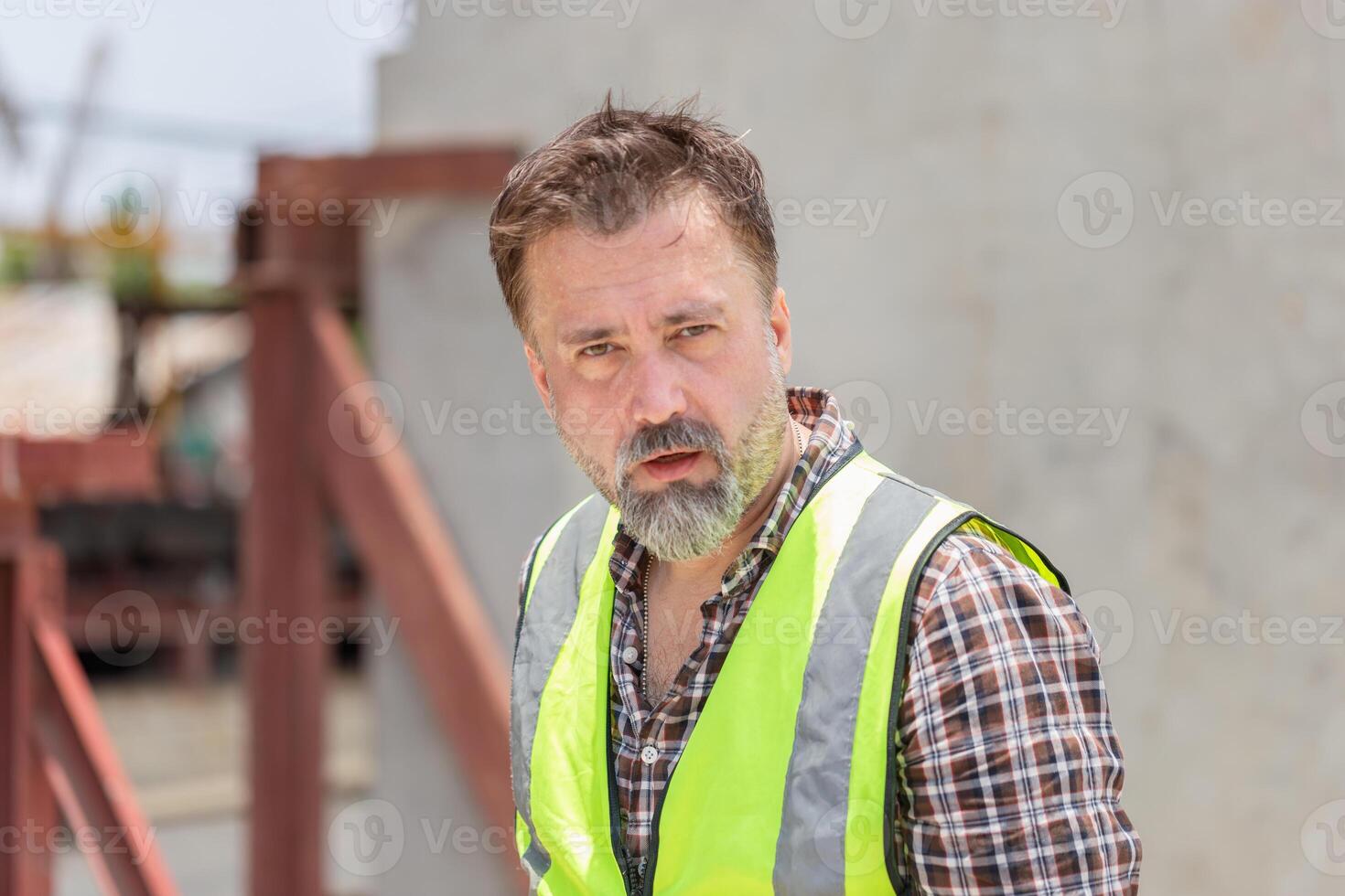 Caucasian engineer on construction site, Engineer and female foreman worker team checking project at precast concrete factory site photo
