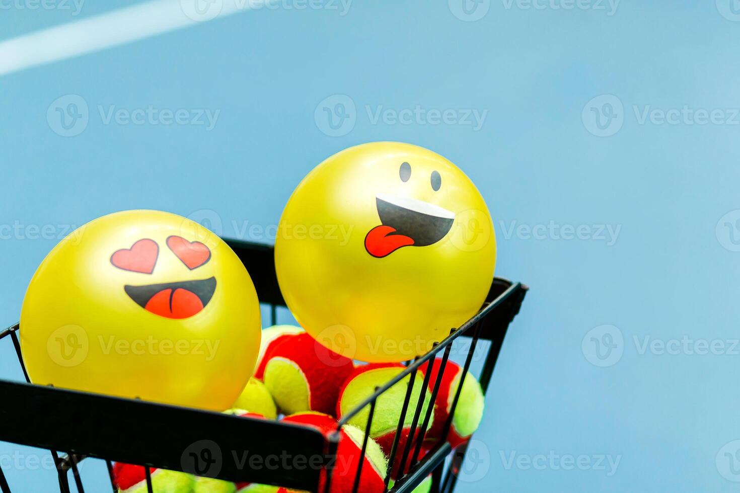 Tennis Ball Basket with Smiley Face Balloons photo
